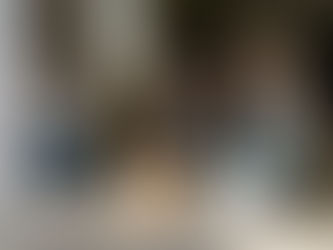 Family sorting clutter in Massachusetts garage