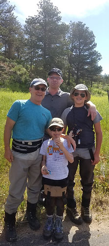 family fly fishing in estes park