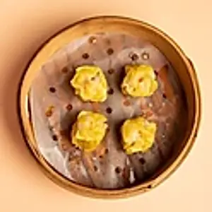 E2. Shaomai: Gedämpfte Teigkrone mit Schweinehackfleischfüllung./ Pork dumplings in thin skin./烧麦