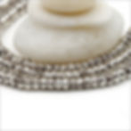 Hill Tribe Silver strand of lightweight spacer beads measures 7" long. Each shiny bead is 2.5mm x 1.5mm with a 1mm hole.
