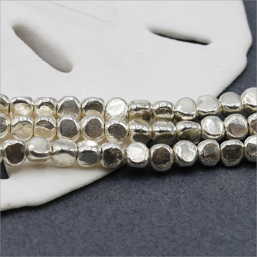 Hill Tribe Silver strand of 3-sided shiny beads measures 4" long