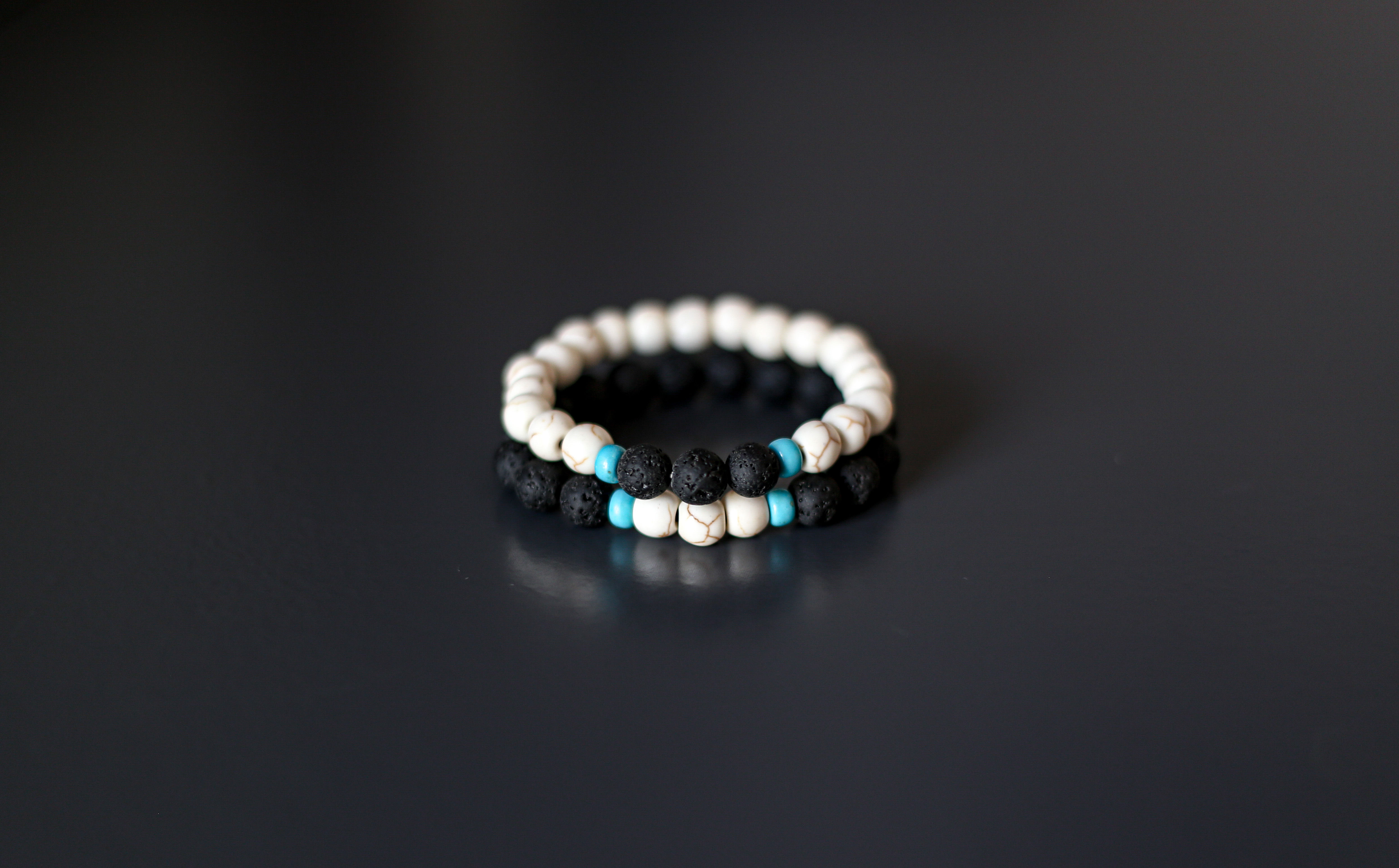 Set of Two Bracelets, White and Blue Turquoise with Black Lava beads