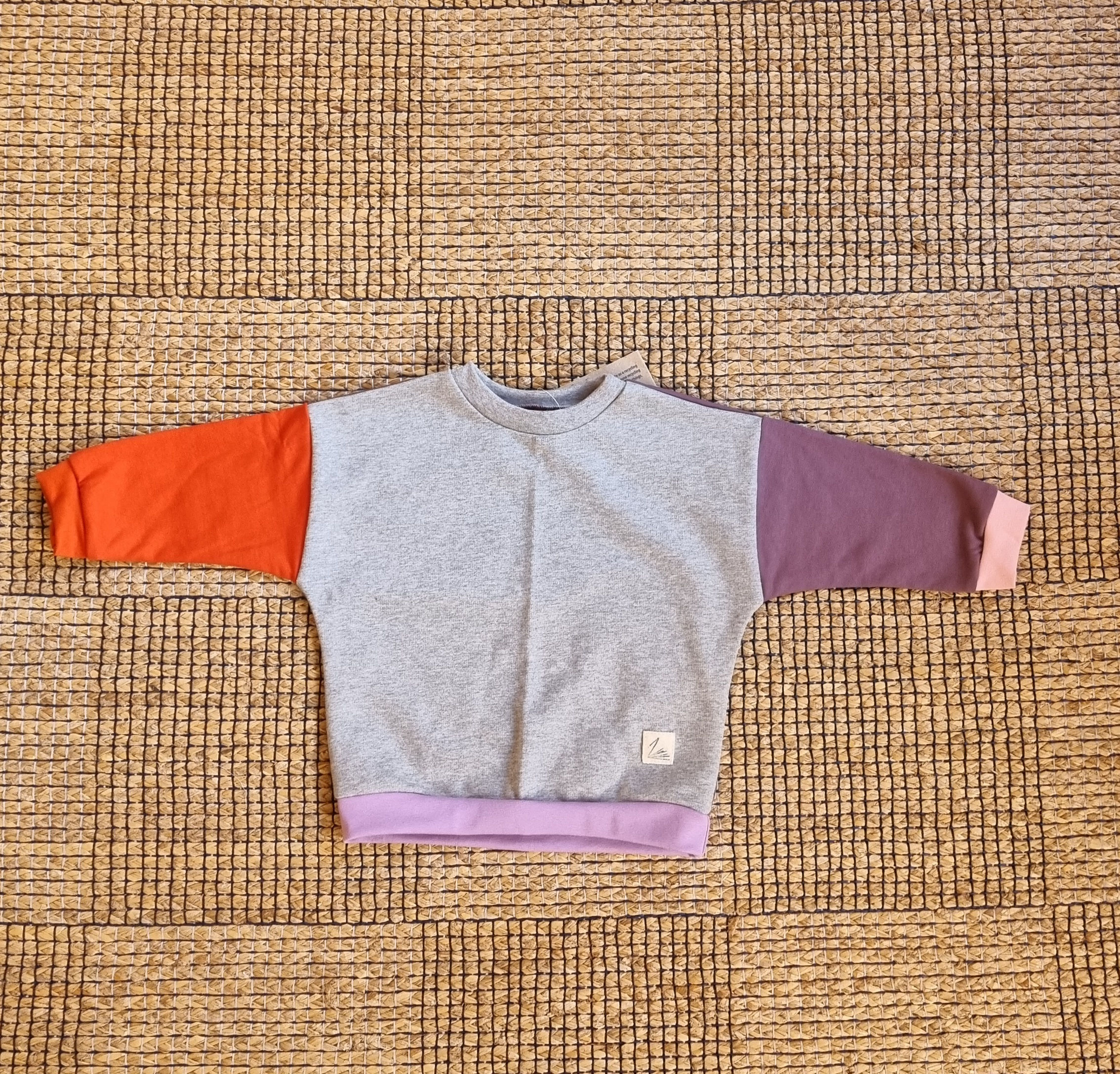 ONE OF A KIND MINI REMIX SWEATER