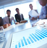 business-meeting-reviewing-charts-in-a-modern-offi-2026-09-22-02-57-12-utc.jpg