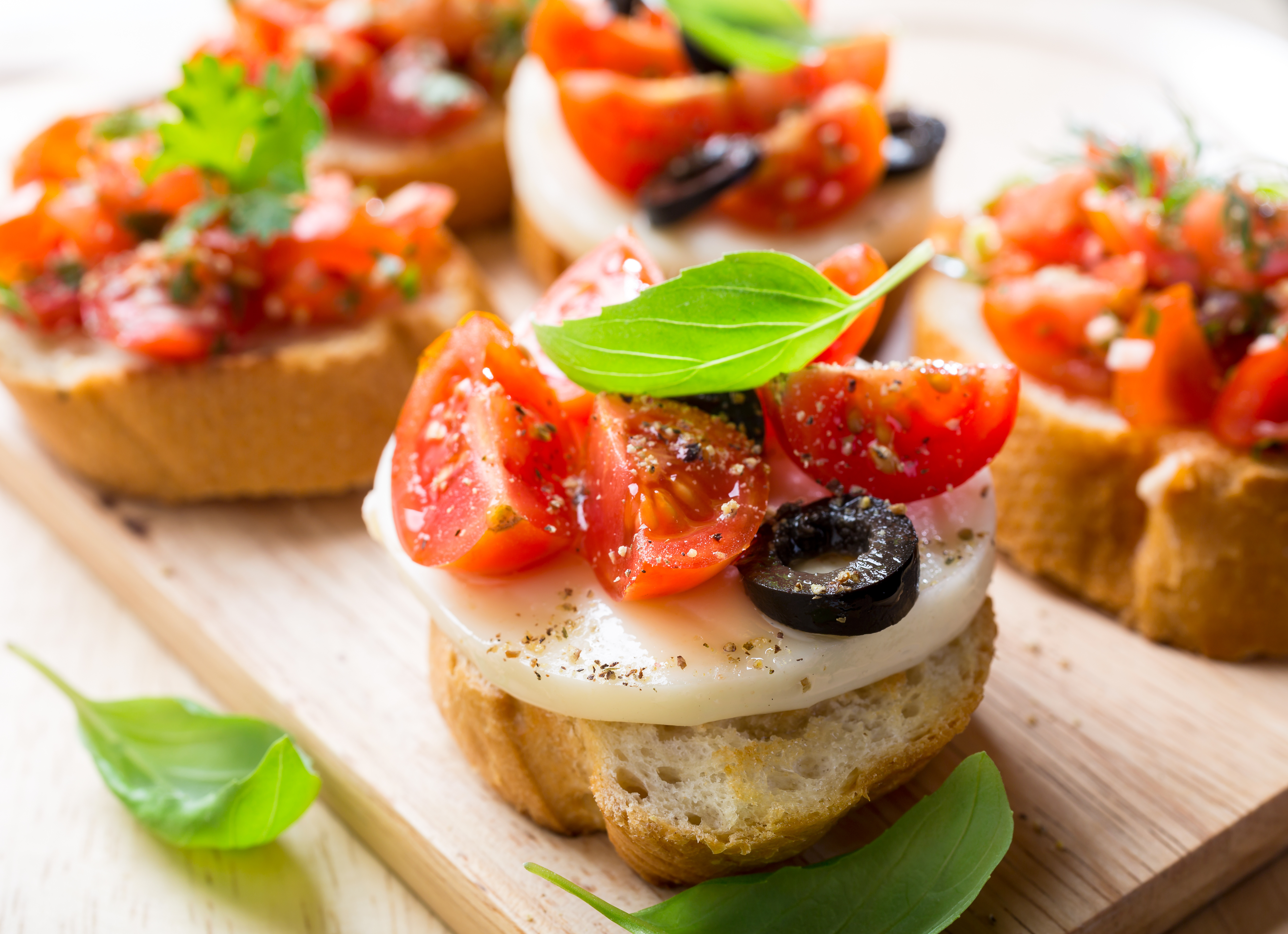 mini sandwich with tomato and olive