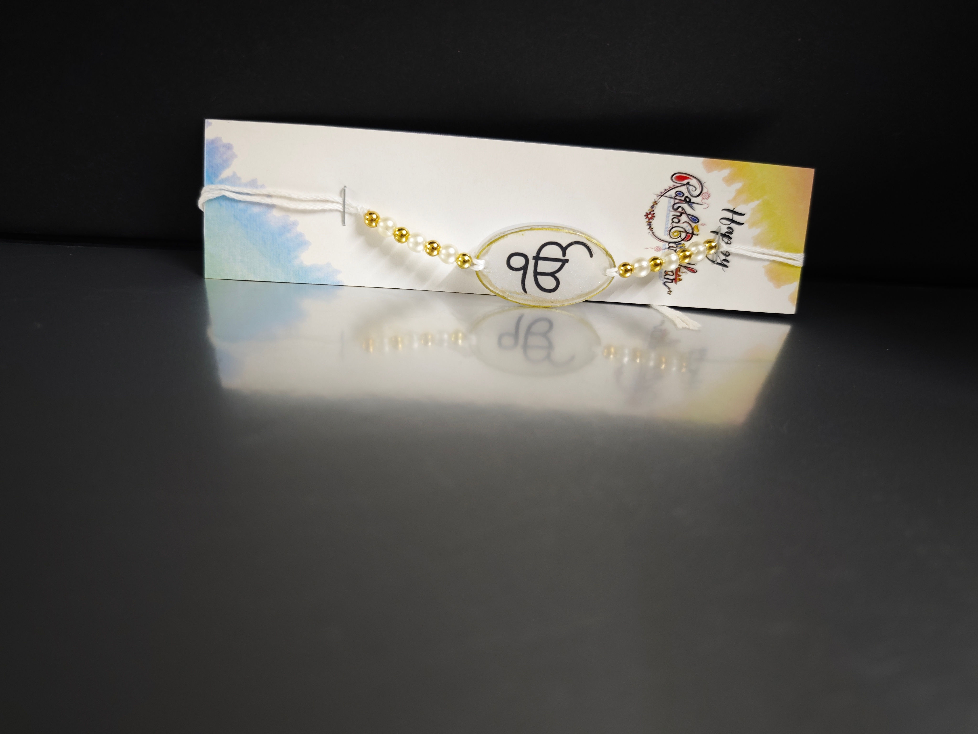 Sacred Ek Onkar Resin Rakhi