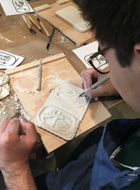 Students carving their ancient Egyptian reliefs