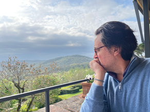 William pondering a landscape with gray skies