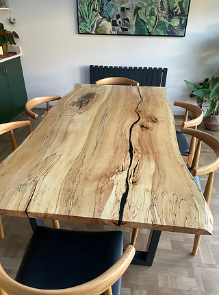 spalted beech dining table with black epoxy river
