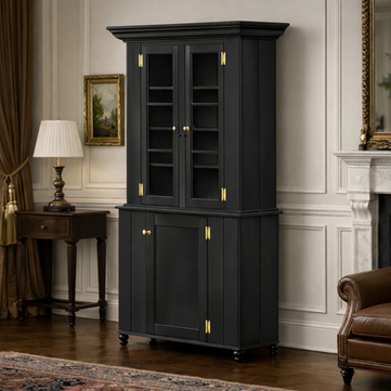 The Sentinel tall cupboard in Historic Charcoal with glass-front upper doors and paneled base.