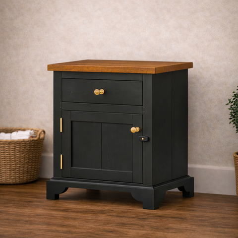 The Patriot early American nightstand in Historic Charcoal with single drawer and paneled cabinet door.