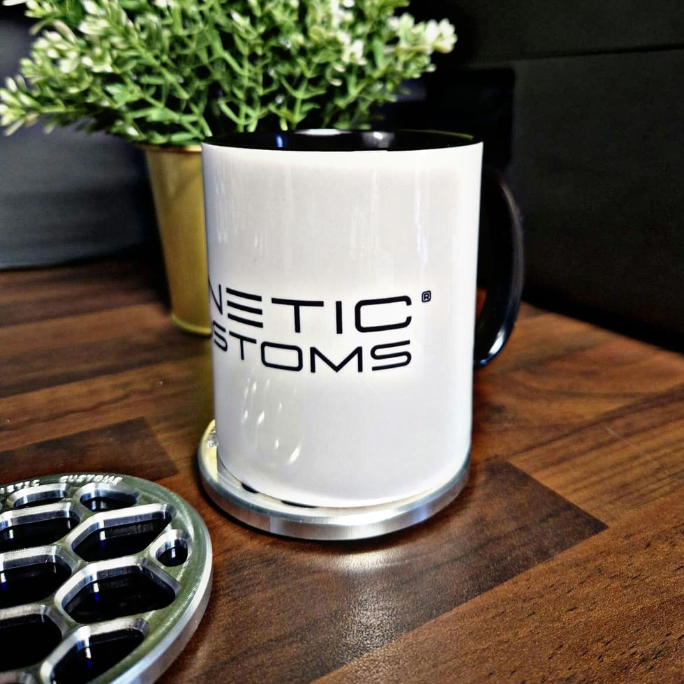 Kinetic Customs Mug on a wooden desk