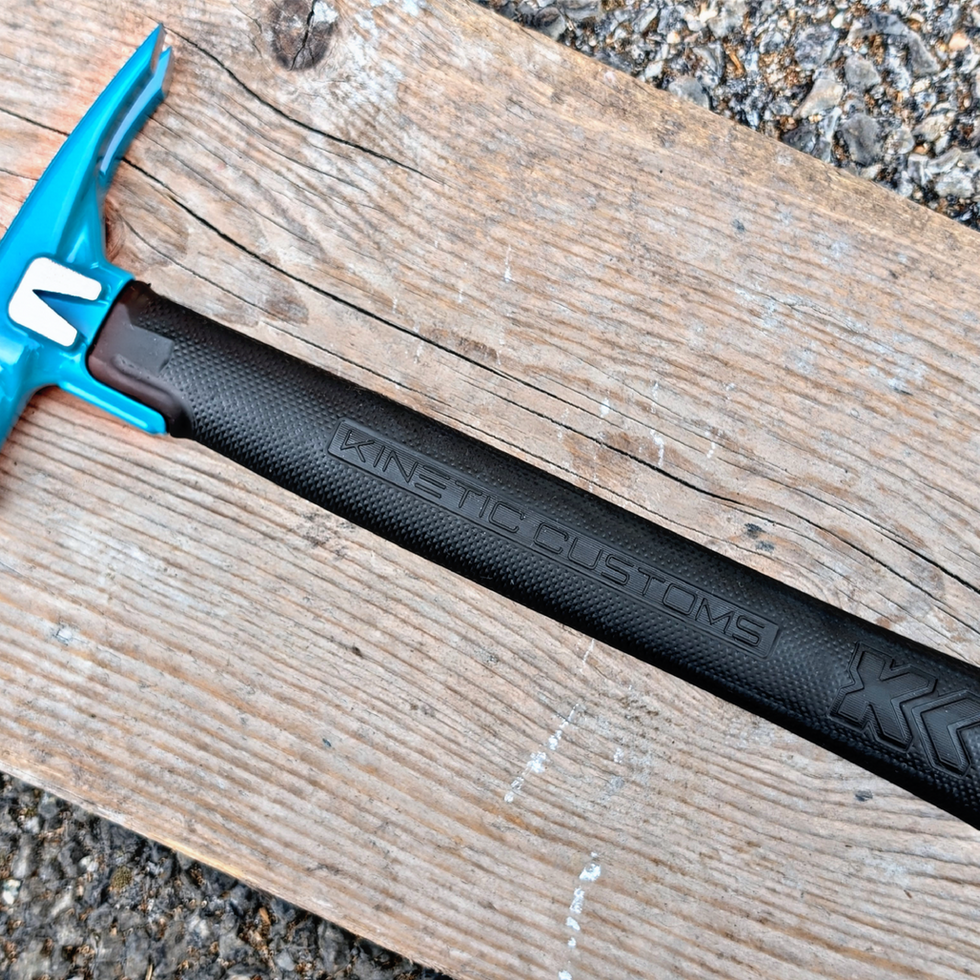 E12 Classic Teal electricians hammer on a wooden board