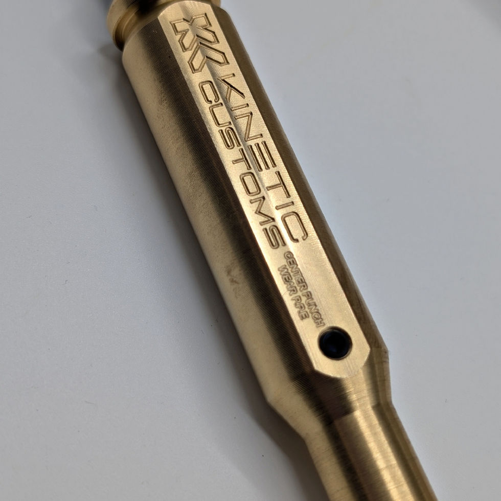 Brass 50 cal centre punch with Kinetic Customs engraving