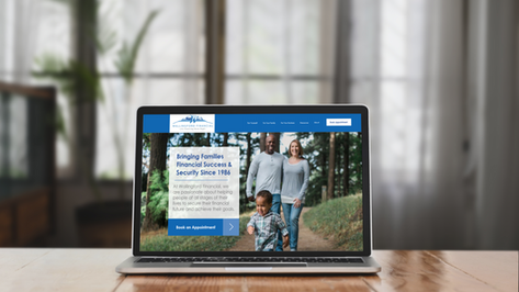 Laptop open to Wallingford Financial Services Home Page Mock-Up