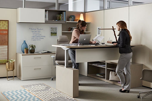 women working at an office desk