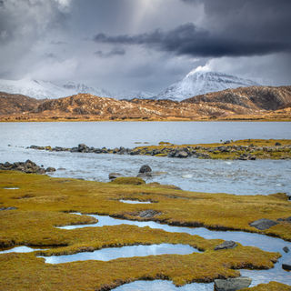 View of snow capped Foinavon, Sutherland, Scotland
