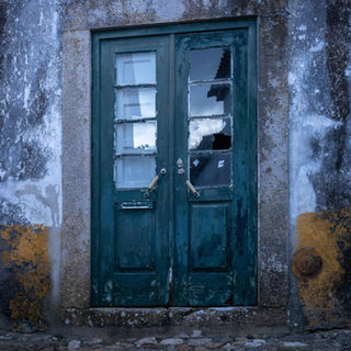 Beautiful patinas on old building in small Portuguese town.
