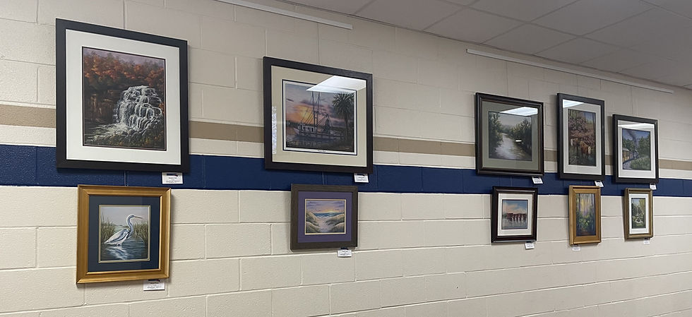 A display of paintings by artist, Al Leitch, at Seven Oaks Gallery