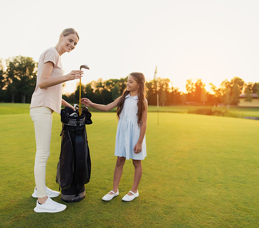 mum-takes-club-teaches-kid-golf-family-hobby.jpg