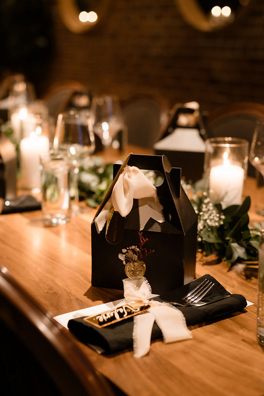 Candlelit dinner table setting for the Luminary Dinner Series in Halifax