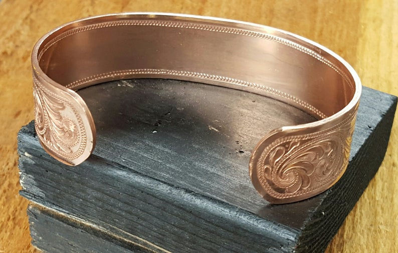 Miniatura: Copper bracelet with Western Bright Cut engraving