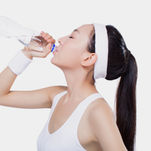 Woman drinking water from bottle