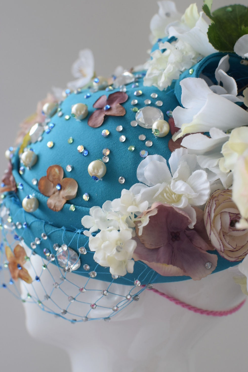 Thumbnail: Turquoise and white blossoms veiled pillbox hat