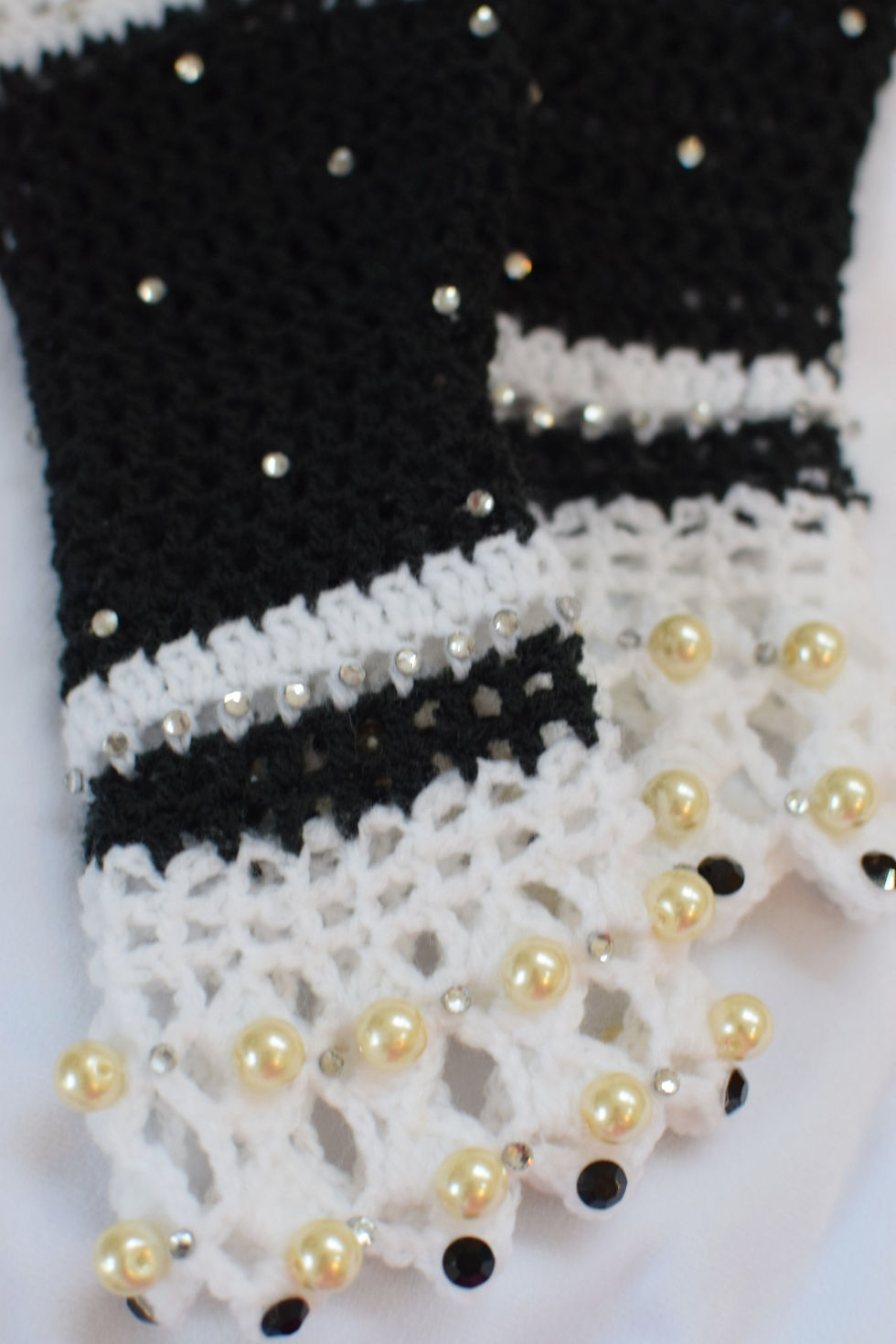 Thumbnail: Black and white crochet fingerless gloves with pearls