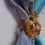 Thumbnail: Yellow Liberty print silk flower scarf ring with Amber 