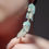 Thumbnail: Cascading minty iridescent statement earrings 