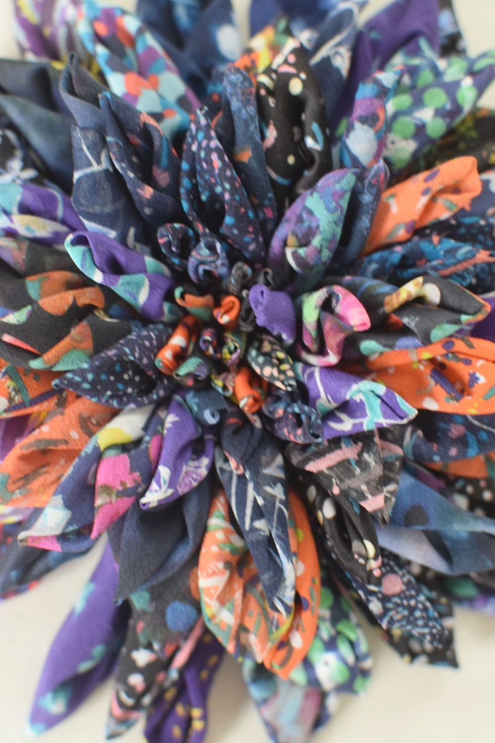 Thumbnail: Liberty print silk flower clip in shades of purple and orange, no crystals 
