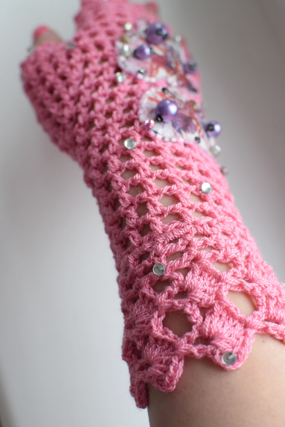 Thumbnail: Pink longer length cotton crochet fingerless gloves with orchids