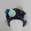 Thumbnail: Purple and shades of teal fluffy pompoms beret