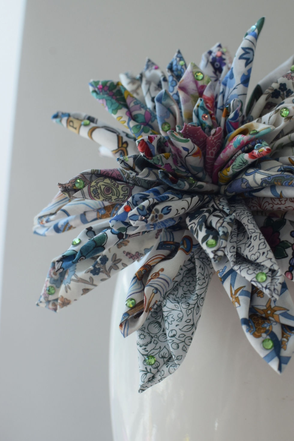 Thumbnail: Liberty print flower clip in white and blue with green Swarovski crystals 