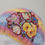 Thumbnail: Pastel rainbow flowers hat and fingerless gloves set