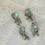 Thumbnail: Cascading minty iridescent statement earrings 