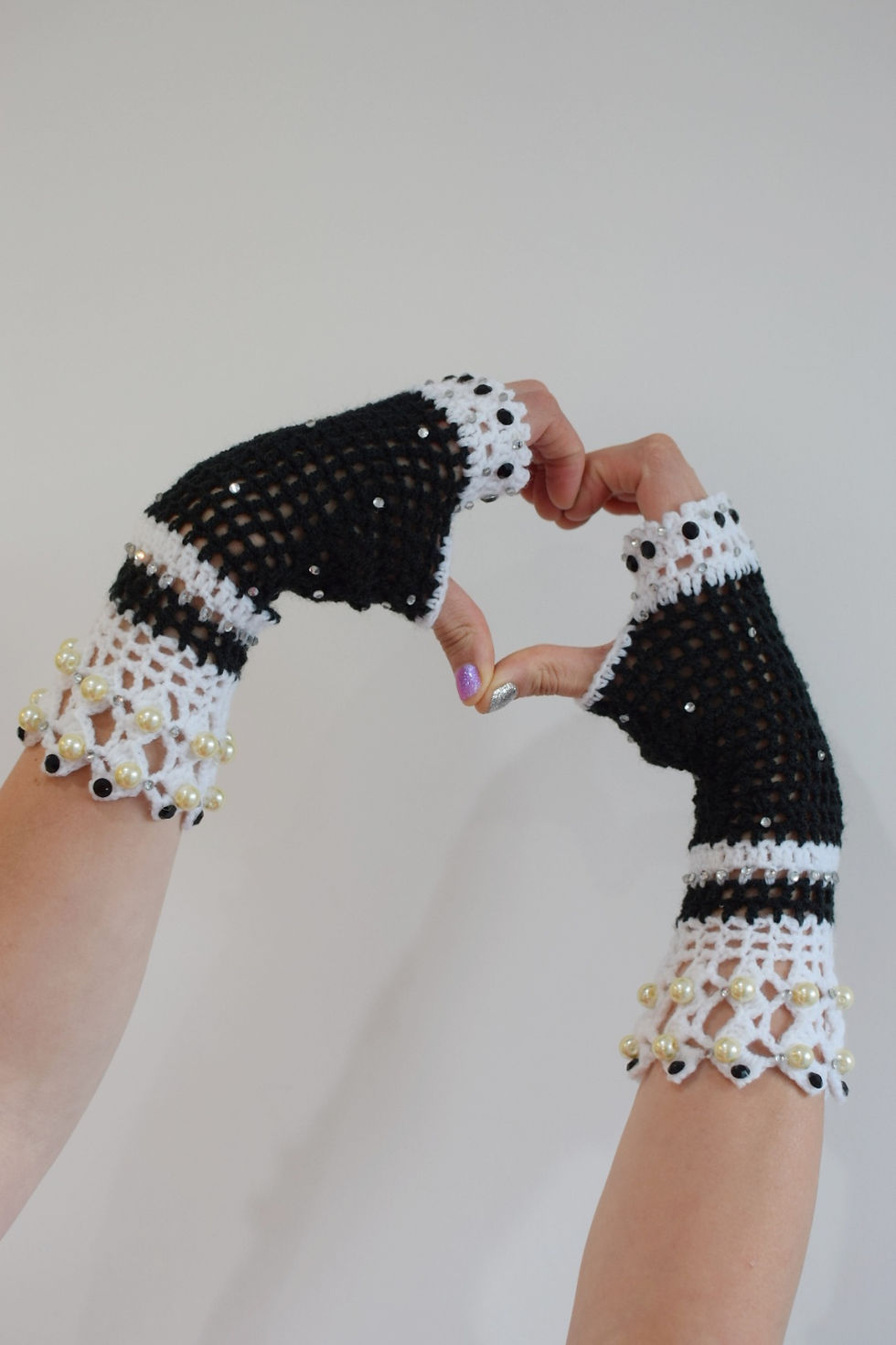 Thumbnail: Black and white crochet fingerless gloves with pearls