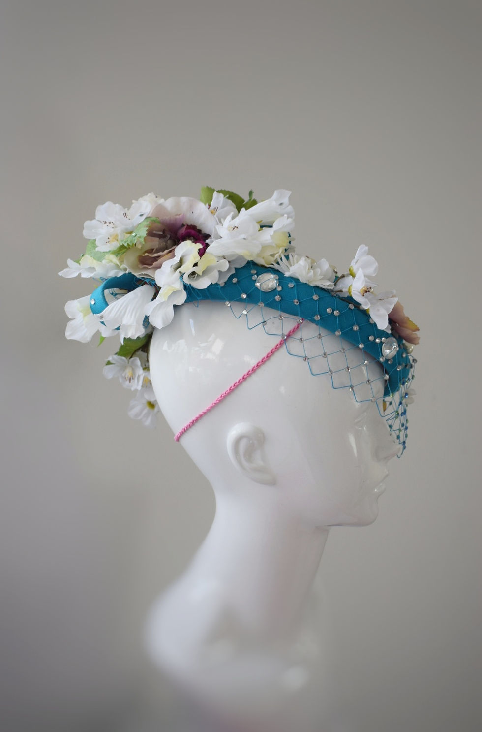 Thumbnail: Turquoise and white blossoms veiled pillbox hat