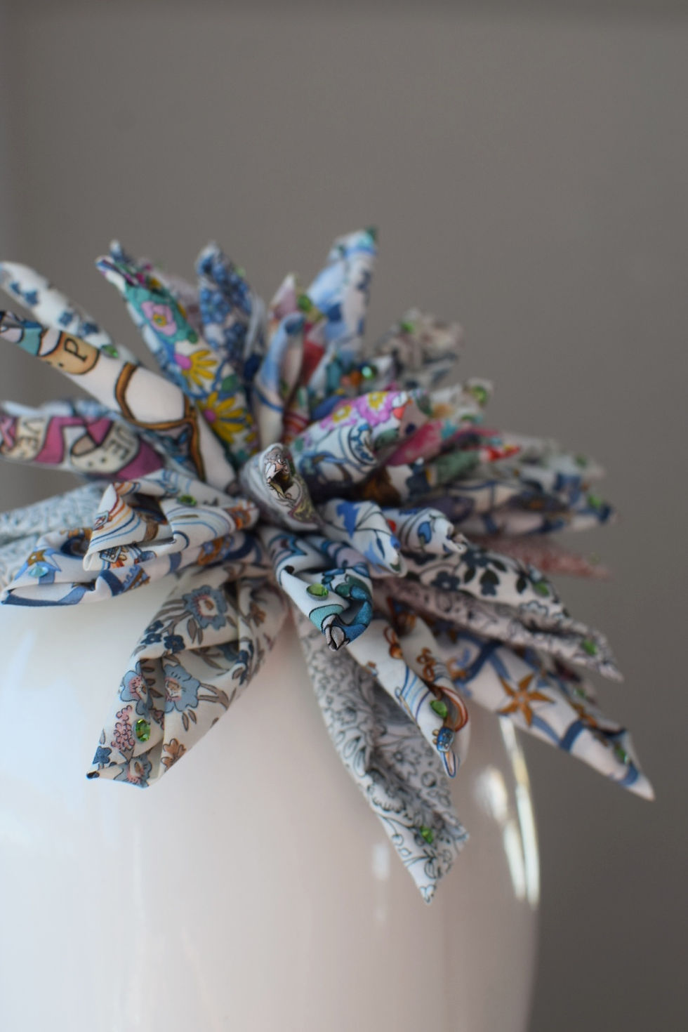 Thumbnail: Liberty print flower clip in white and blue with green Swarovski crystals 