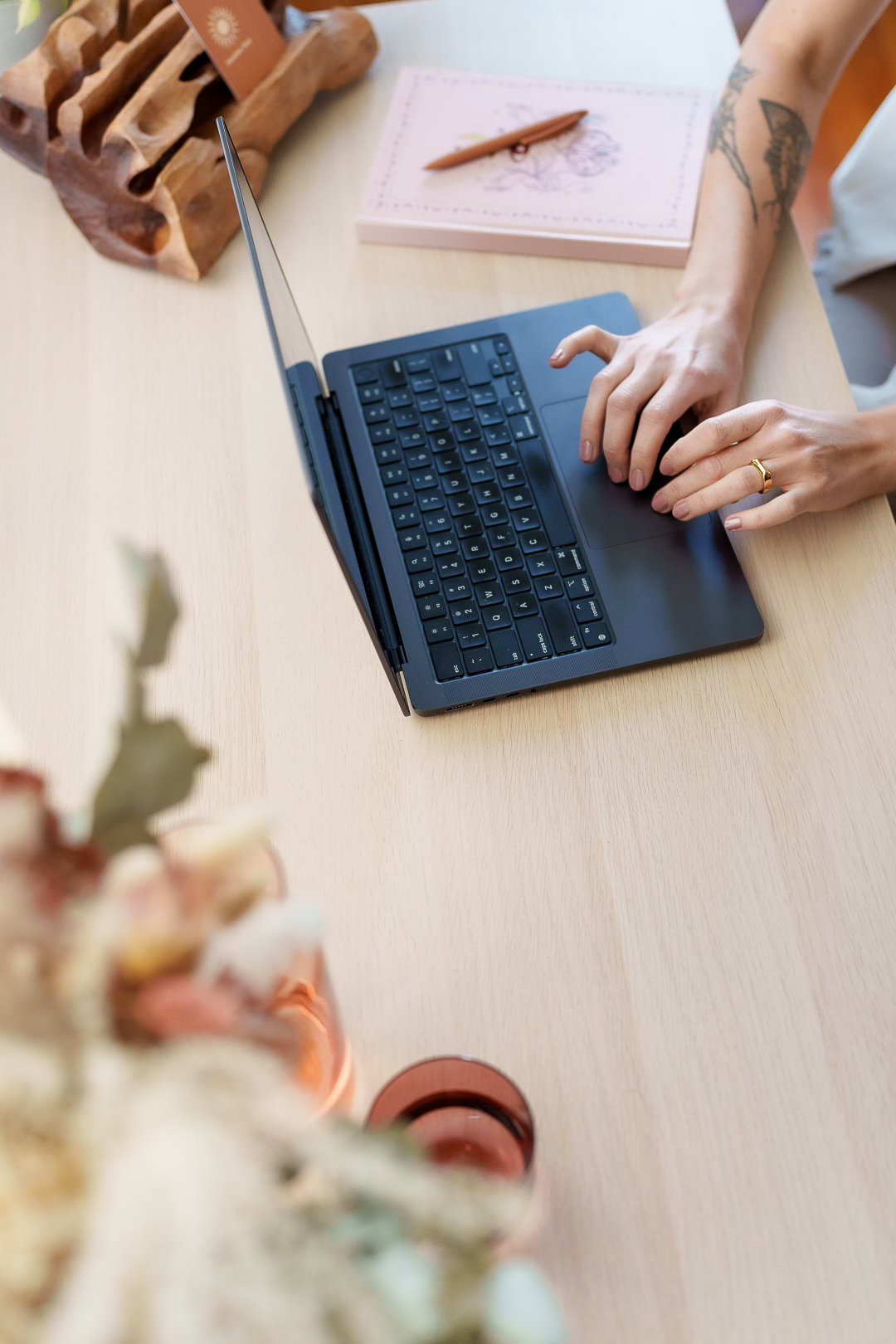 Close-up of a computer, showing the process of creating authentic brand photography.