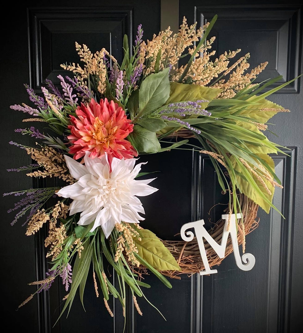 [PHOTO: By Faith Collins. This wreath is a lovely example of a wreath you could display from Spring into the Fall. It would also be nice without a letter or with an extra-large letter embellishment. From page 126 of Our Story Magazine, Spring 2022.]