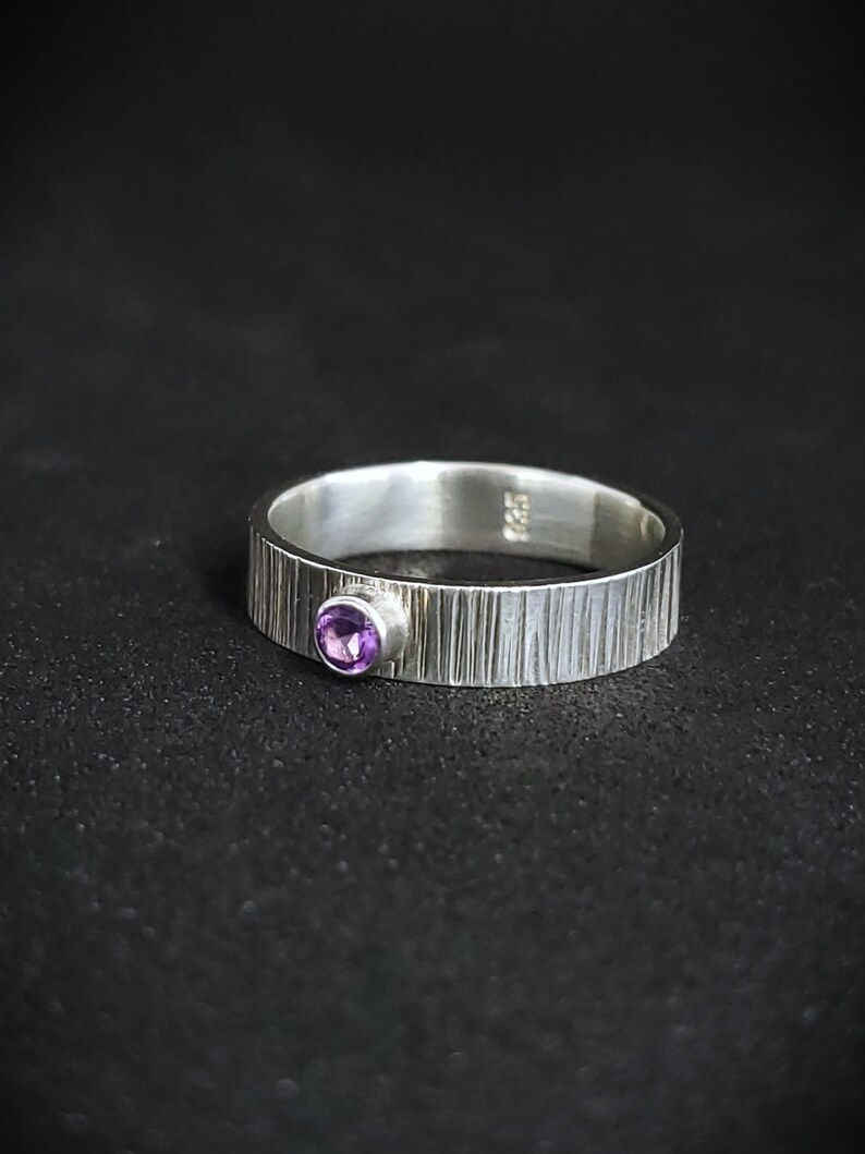 Thumbnail: Line texture ring band with amethyst accent stone