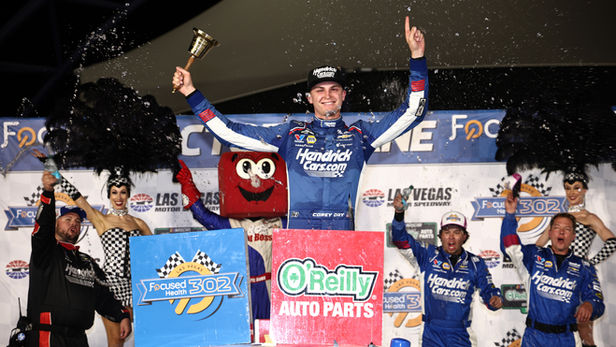 LAS VEGAS, NEVADA - OCTOBER 03: Corey Day, driver of the #17 HendrickCars.com Chevrolet, celebrates in victory lane after winning the NASCAR O'Reilly Auto Parts Series Focused Health 302 at Las Vegas Motor Speedway on October 03, 2026 in Las Vegas, Nevada.