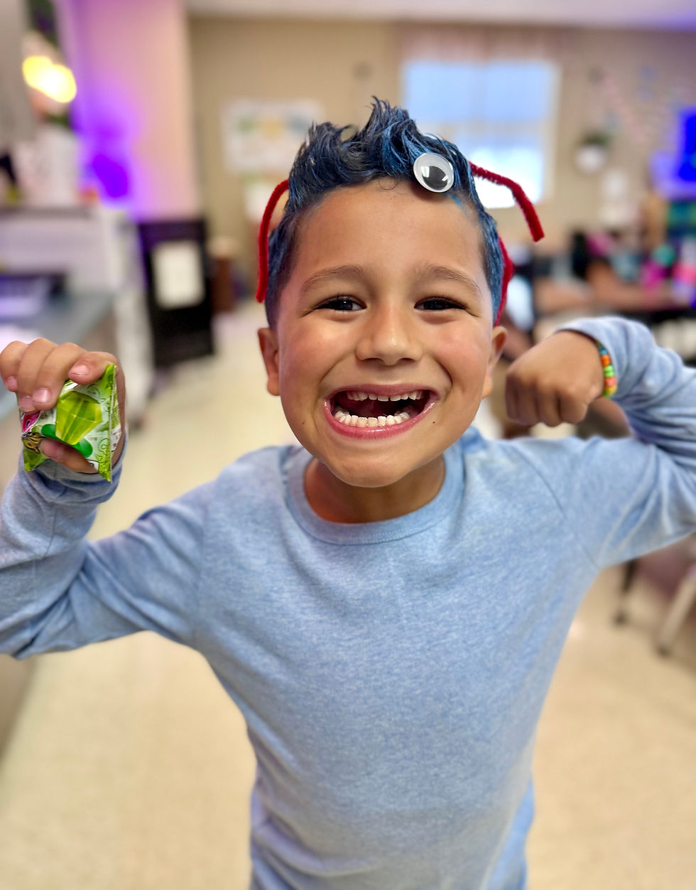 Elementary student celebrating during classroom activity