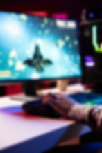 close-up-gamer-navigating-with-spacecraft-galaxy-shooting-asteroids.jpg