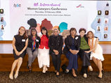 Eight women at the VIII International Women Lawyers Conference