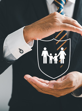 Businessman protective stance symbolizes comprehensive insurance for family, life, health,