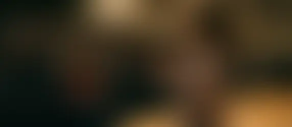 A young speaker practices delivering a speech to an audience, building confidence through real performance.