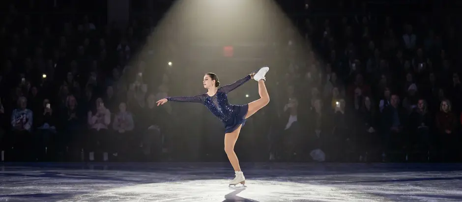 Figure skater performing confidently under pressure
